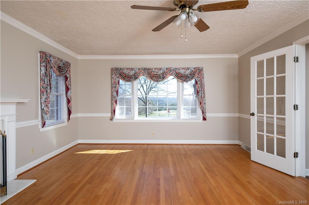 3780 Sawmill Road Hickory Grove, SC 29717 - Photo 33 of 35 wooden floor in an empty room with a window