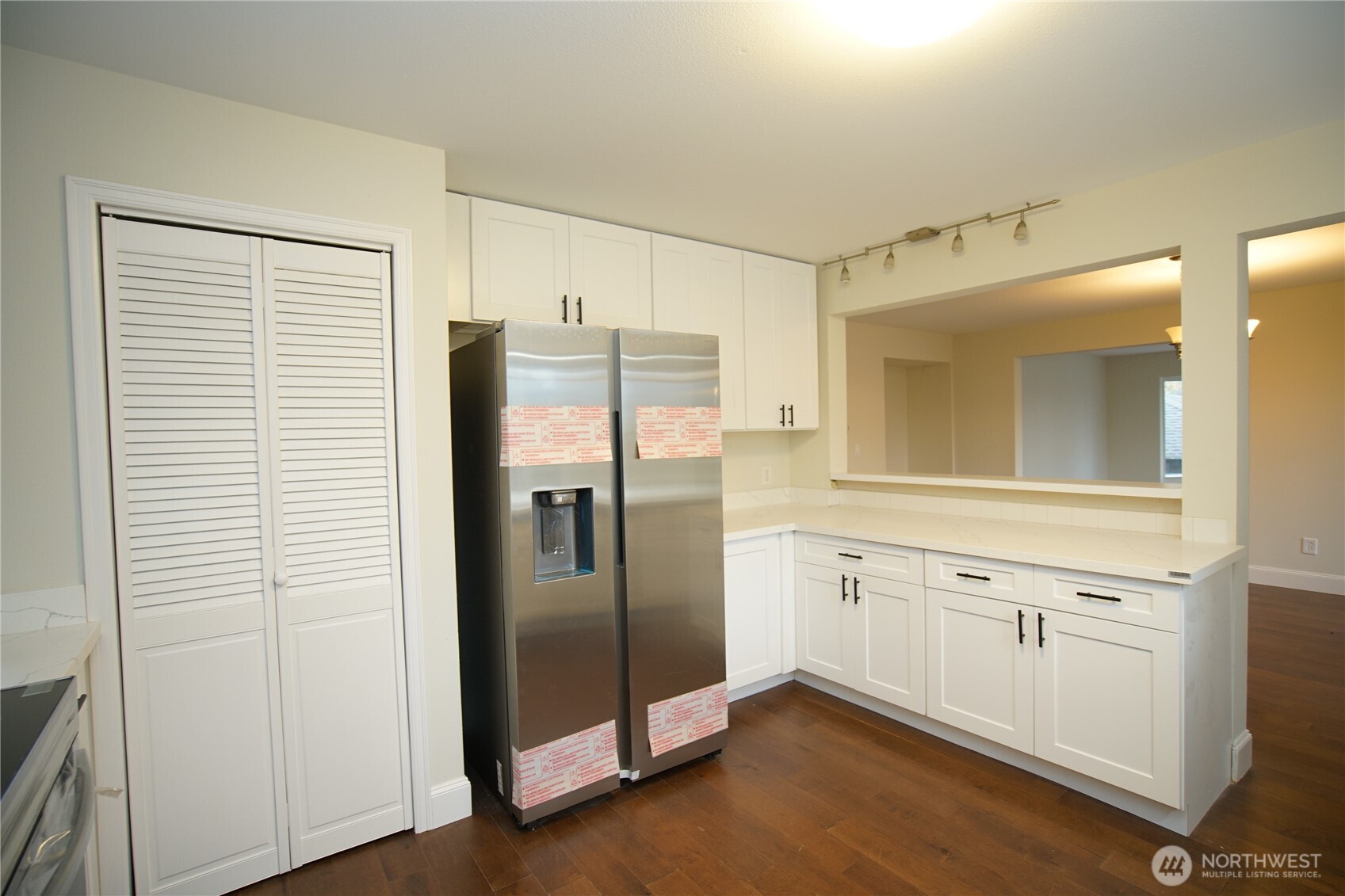 2811 Southwest 350th Place Federal Way, WA 98023 - Photo 5 of 23 a kitchen with stainless steel appliances granite countertop a refrigerator and a sink