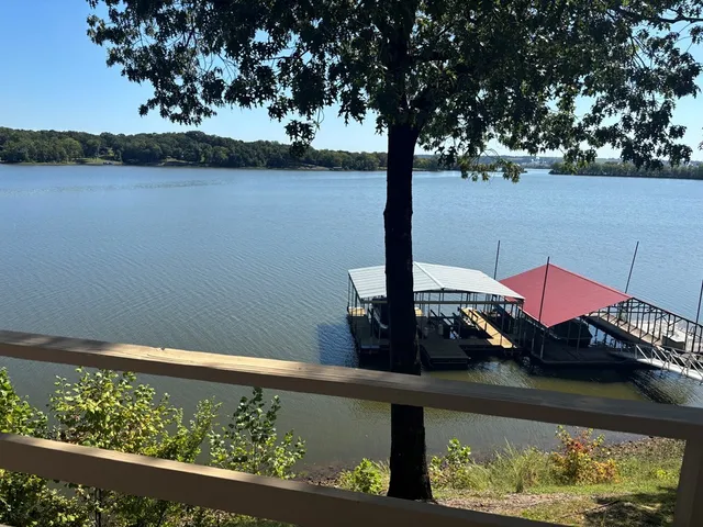 a view of a lake from a balcony