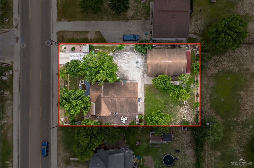 218 East Sam Houston Boulevard Pharr, TX 78577 - Photo 23 of 25 an aerial view of a house with a yard