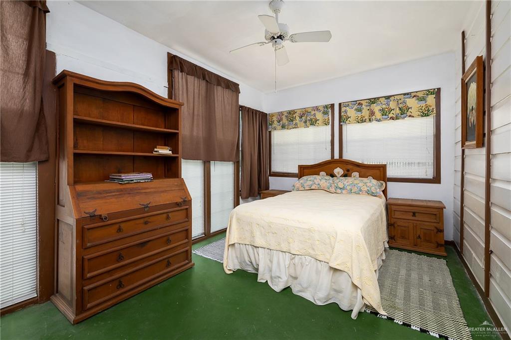 218 East Sam Houston Boulevard Pharr, TX 78577 - Photo 9 of 25 a bedroom with a bed and a window
