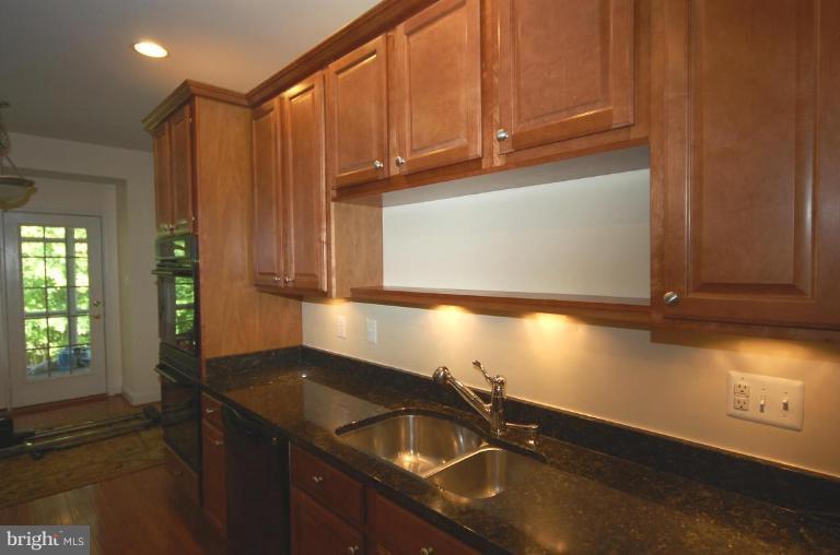 2622 Monocacy Ford Road Frederick, MD 21701 - Photo 9 of 12 a kitchen with a sink and cabinets
