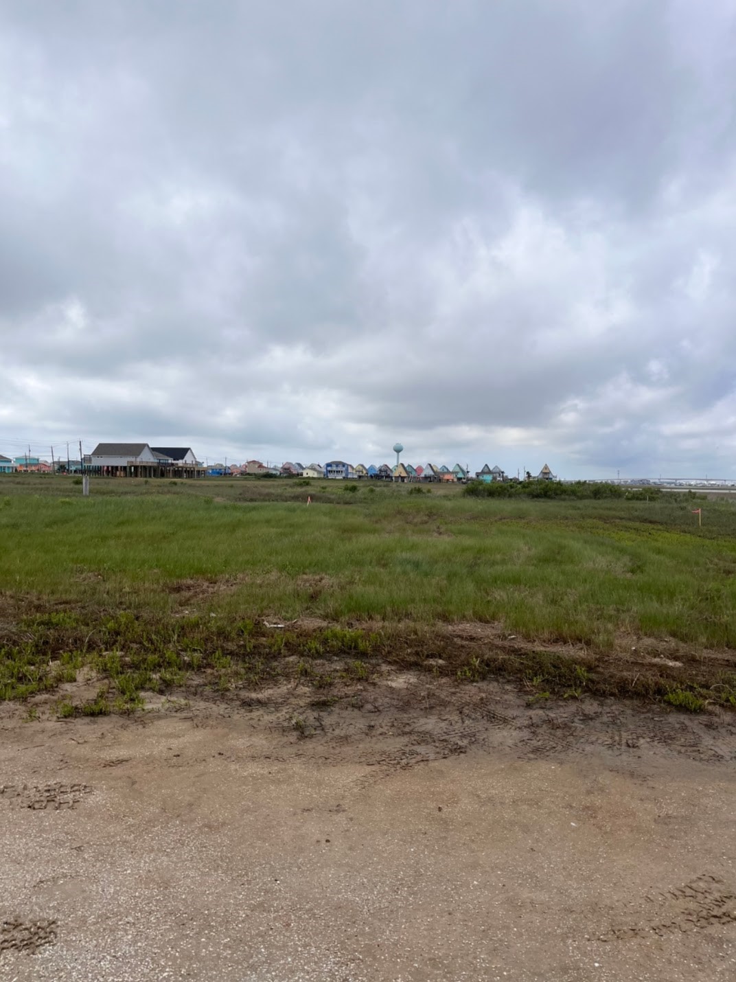 0 Nesmith Place Freeport, TX 77541 - Photo 5 of 8 an aerial view of beach and residential houses with outdoor space