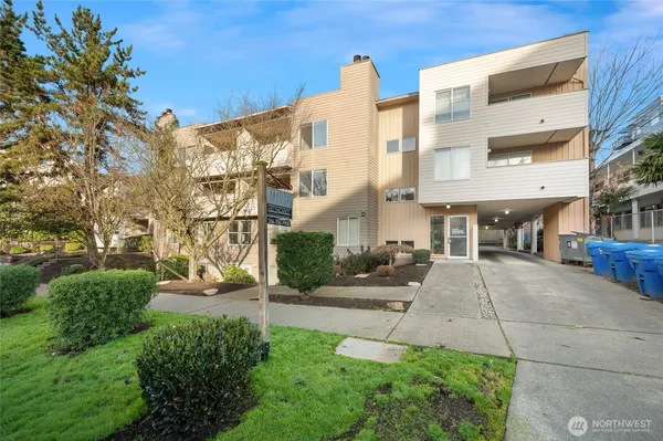 a view of a building with a yard