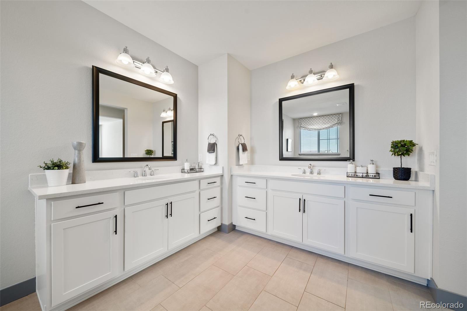6465 Barnstead Drive Castle Pines, CO 80108 - Photo 20 of 50 a bathroom with a toilet sink and mirror