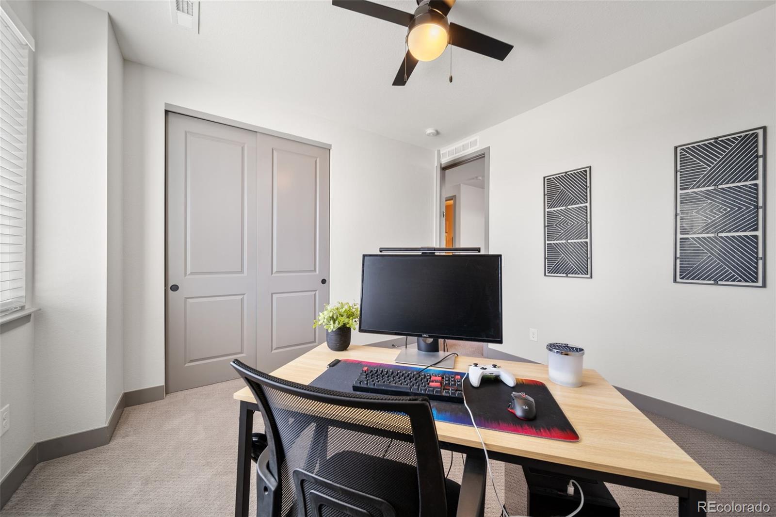 6465 Barnstead Drive Castle Pines, CO 80108 - Photo 27 of 50 a view of a workspace with furniture