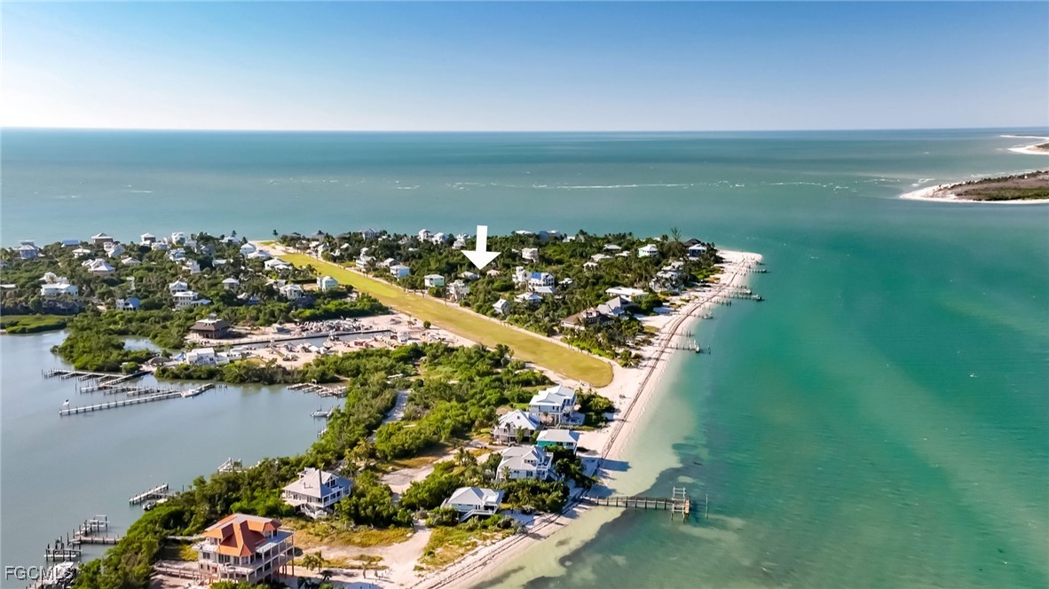 181 Swallow Drive Upper Captiva, FL 33924 - Photo 15 of 17 a view of a lake with a house