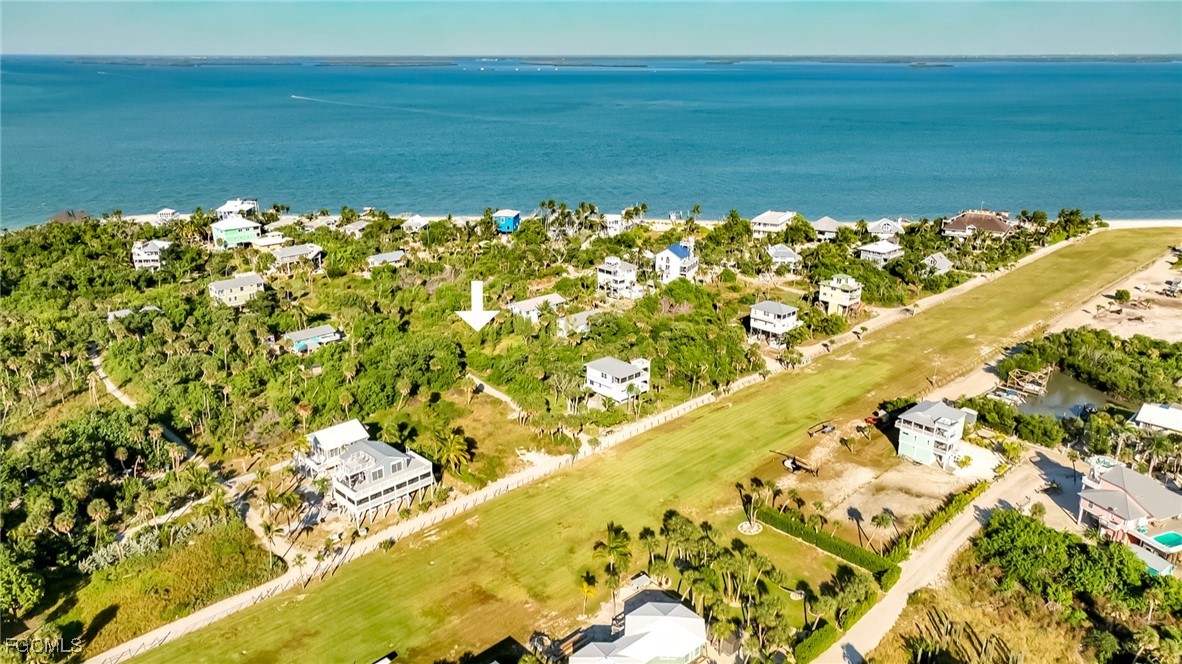 181 Swallow Drive Upper Captiva, FL 33924 - Photo 16 of 17 a view of a large yard