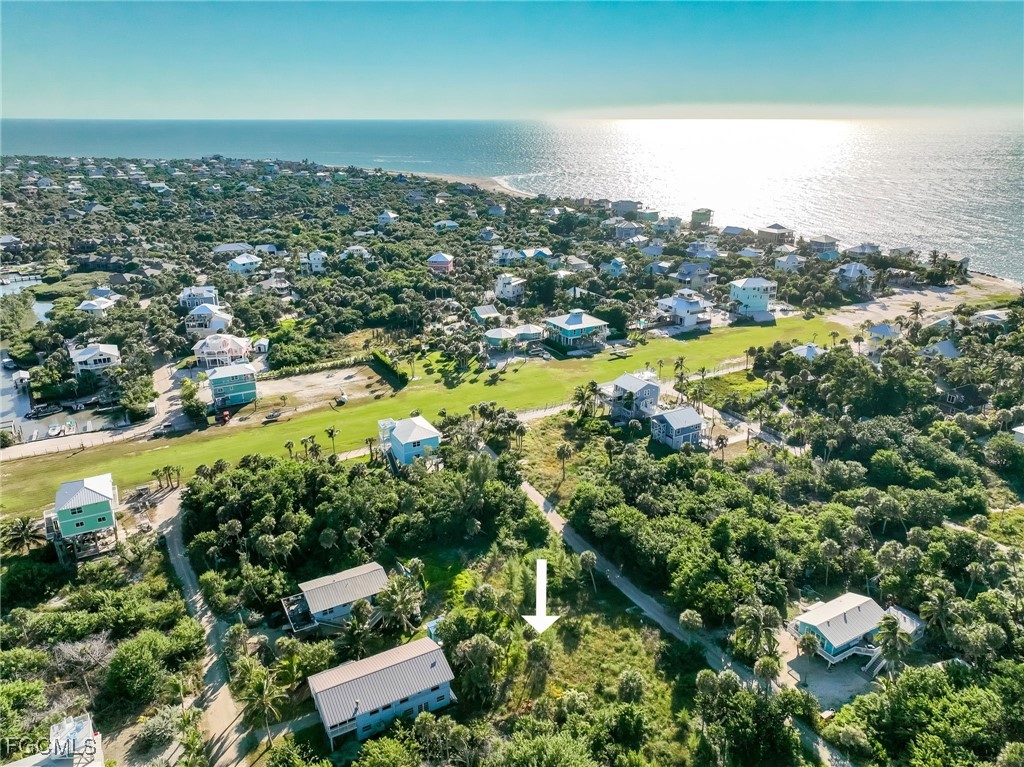 181 Swallow Drive Upper Captiva, FL 33924 - Photo 6 of 17 an aerial view of residential houses with outdoor space and trees