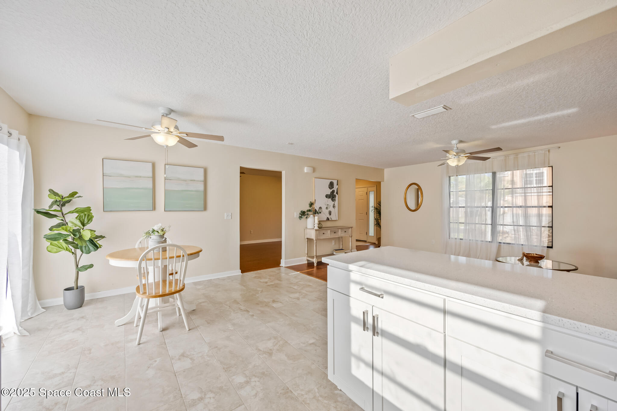 286 Alegriano Road Northwest Palm Bay, FL 32907 - Photo 9 of 24 a spacious bathroom with a sink double vanity and a mirror