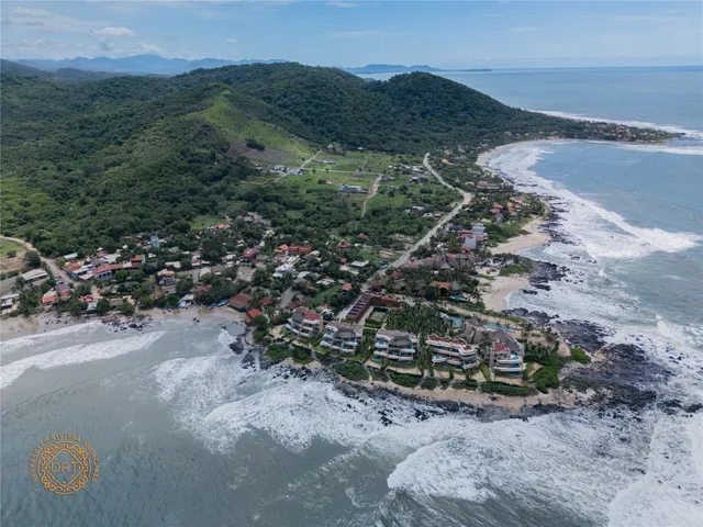 a view of a city with an ocean