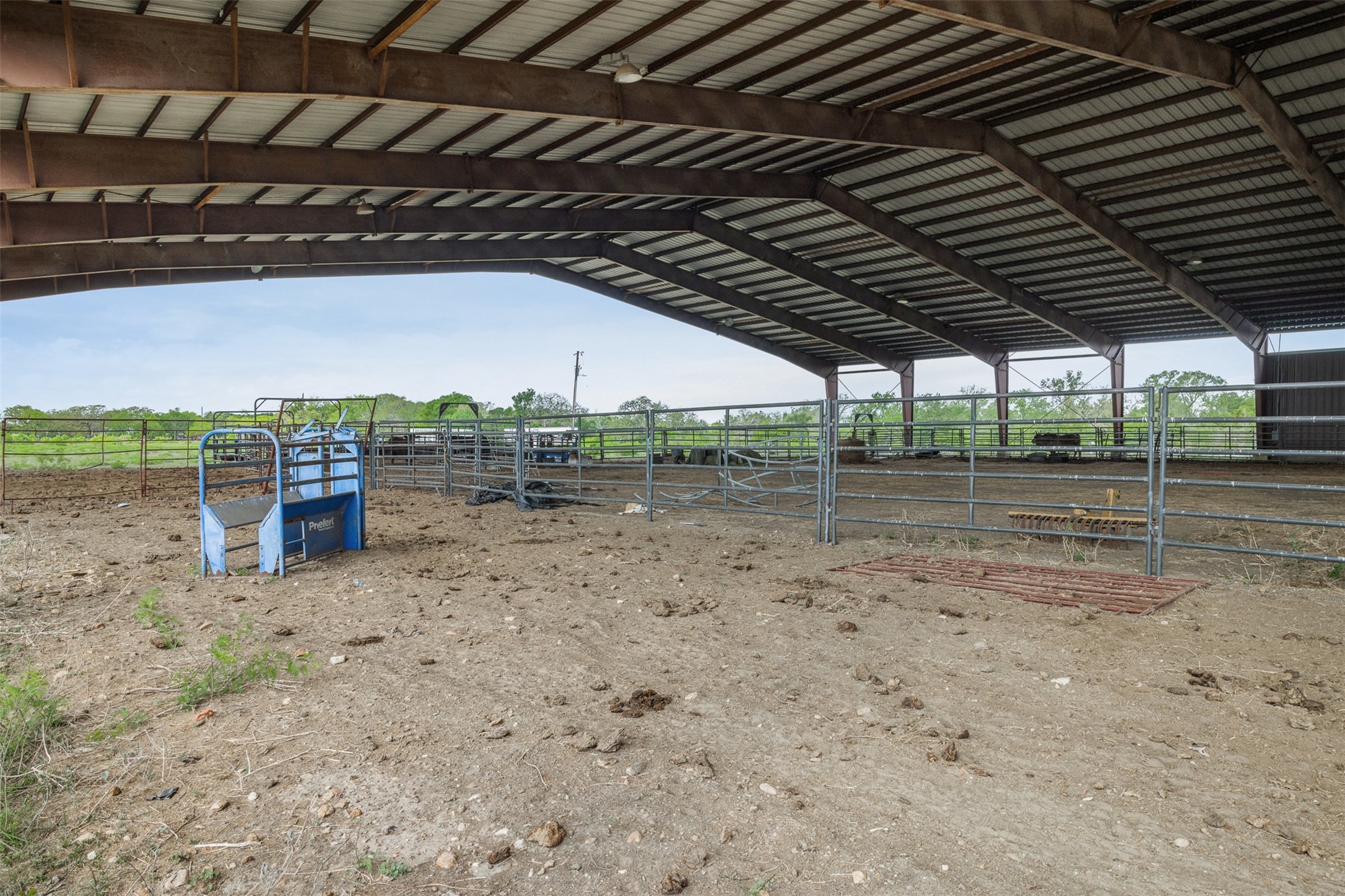 8519 State Park Road Lockhart, TX 78644 - Photo 4 of 40 View of indoor horse riding arena featuring a view of countryside