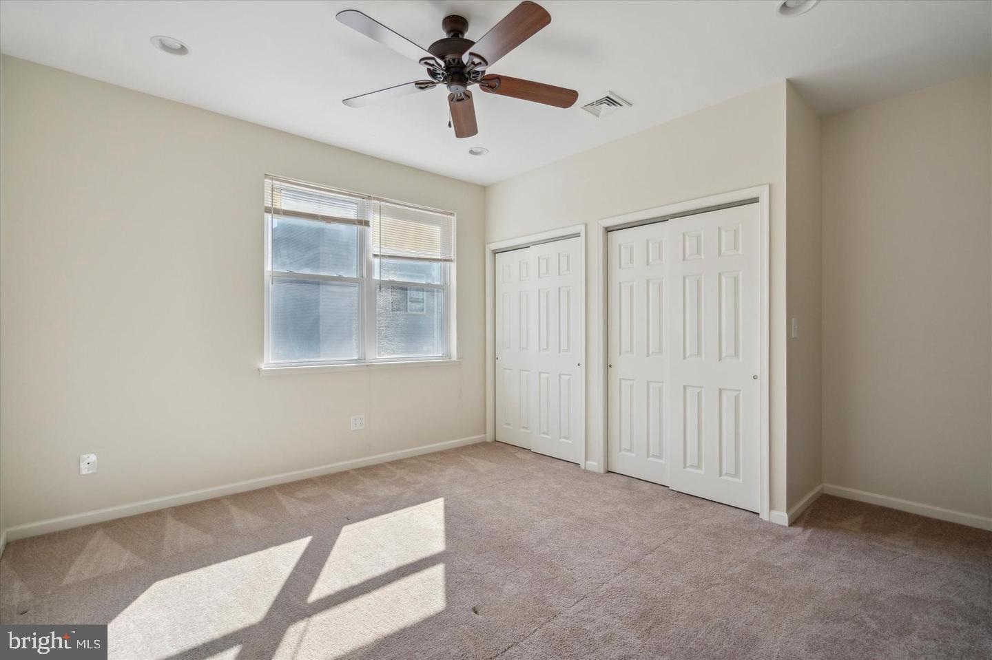 118 Richmond Street, Unit 2B Philadelphia, PA 19125 - Photo 12 of 14 a view of an empty room with a window