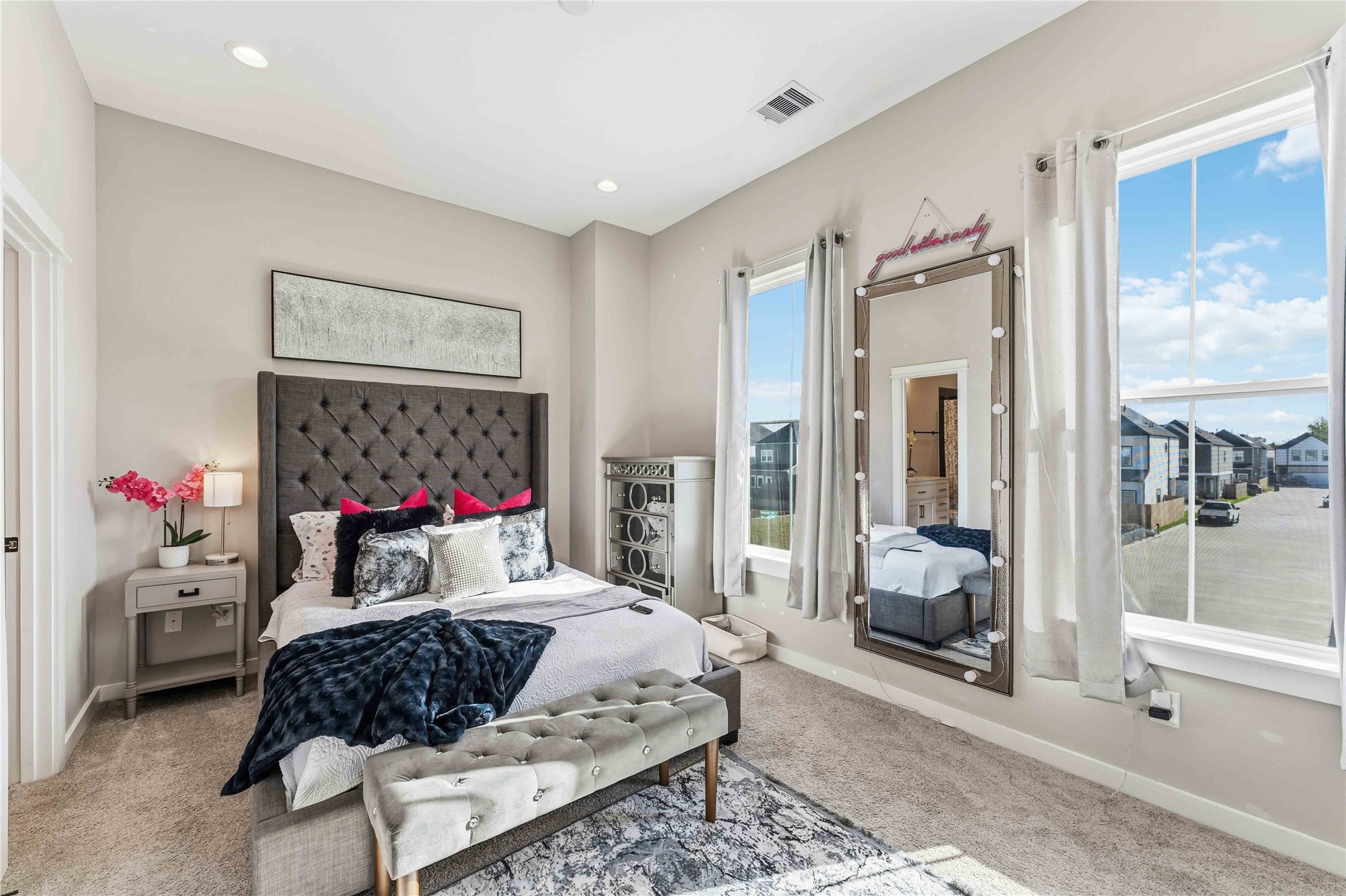 405 Stonework Garden Lane Houston, TX 77076 - Photo 16 of 23 a bedroom with a bed and wooden floor