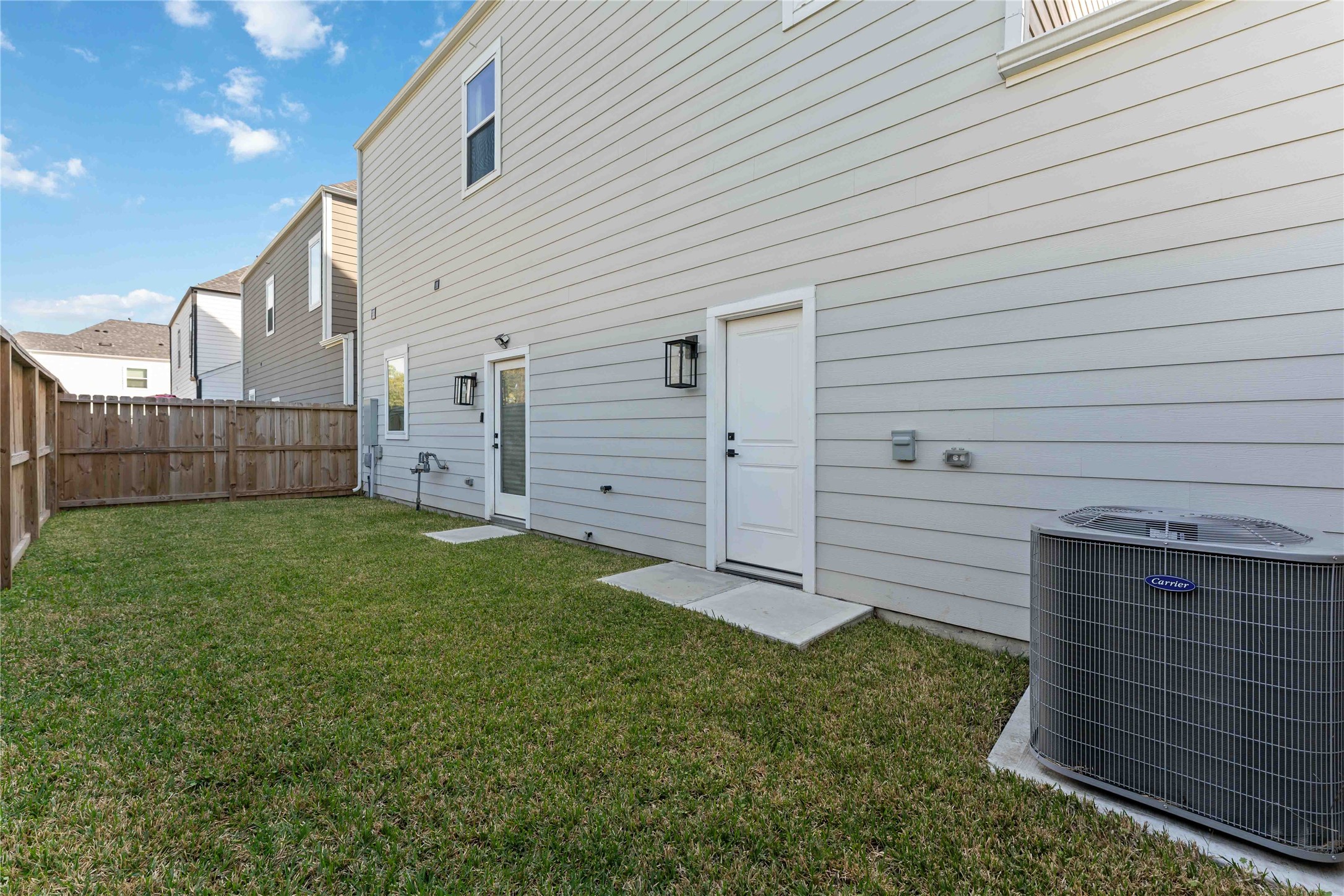 405 Stonework Garden Lane Houston, TX 77076 - Photo 22 of 23 a view of a backyard