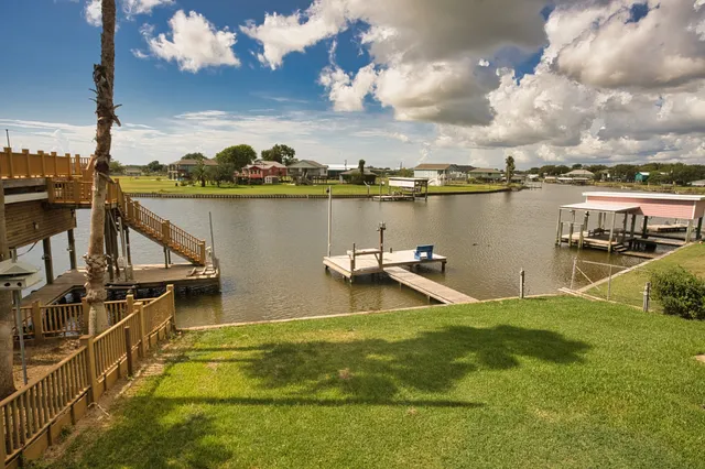 a view of a lake with a house