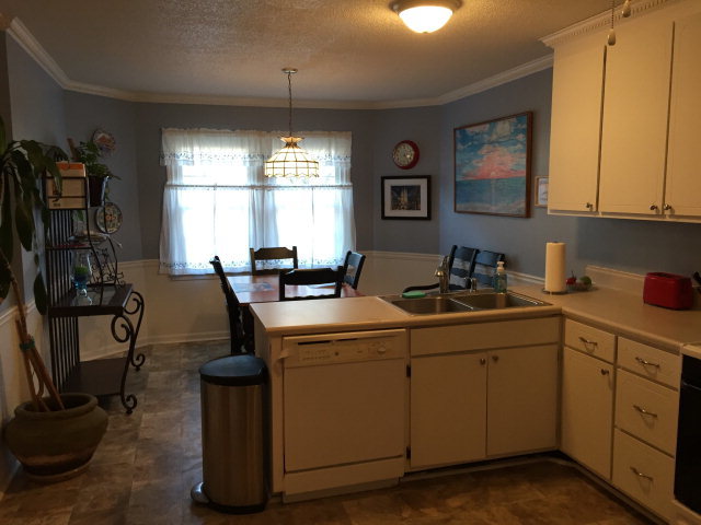 5798 Huddersfield Road Macon, GA 31210 - Photo 12 of 35 a room with sink a mirror and window