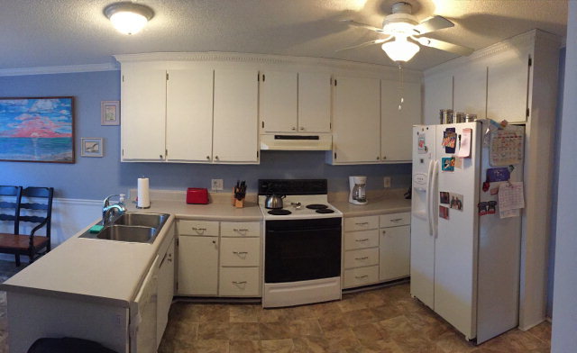 5798 Huddersfield Road Macon, GA 31210 - Photo 14 of 35 a kitchen with stainless steel appliances granite countertop a refrigerator and a stove top oven