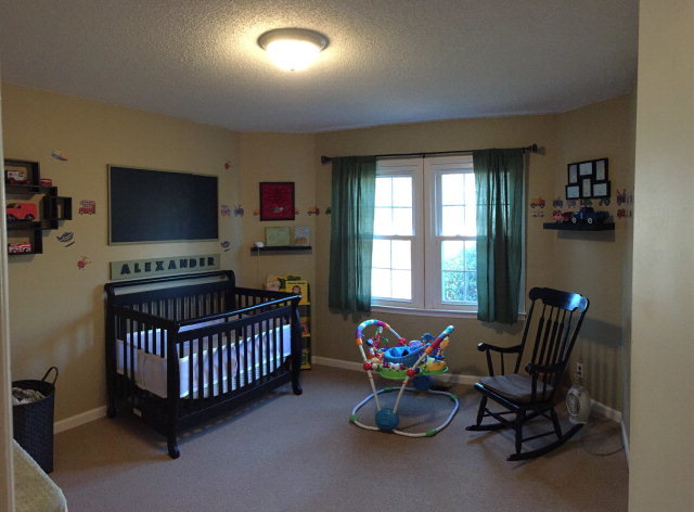5798 Huddersfield Road Macon, GA 31210 - Photo 16 of 35 a living room with furniture and a flat screen tv