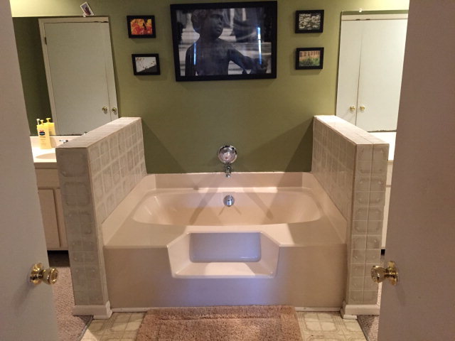 5798 Huddersfield Road Macon, GA 31210 - Photo 22 of 35 a bathroom with a sink and mirror