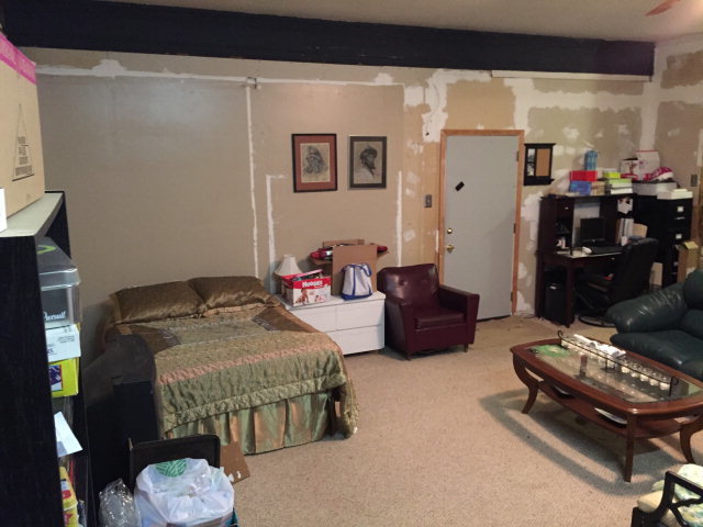 5798 Huddersfield Road Macon, GA 31210 - Photo 25 of 35 a bedroom with furniture and a mirror