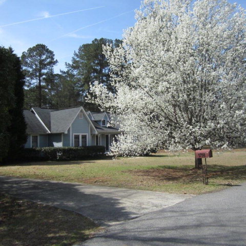 5798 Huddersfield Road Macon, GA 31210 - Photo 33 of 35 a front view of a house with a yard