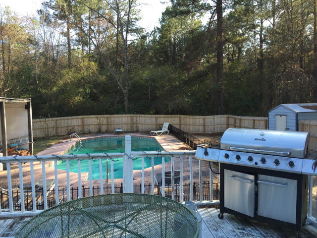 5798 Huddersfield Road Macon, GA 31210 - Photo 5 of 35 a view of an outdoor sitting area with brick walls