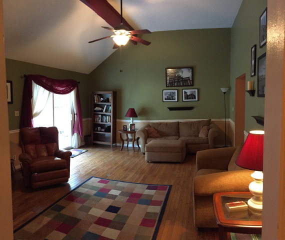 5798 Huddersfield Road Macon, GA 31210 - Photo 6 of 35 a living room with furniture and a rug