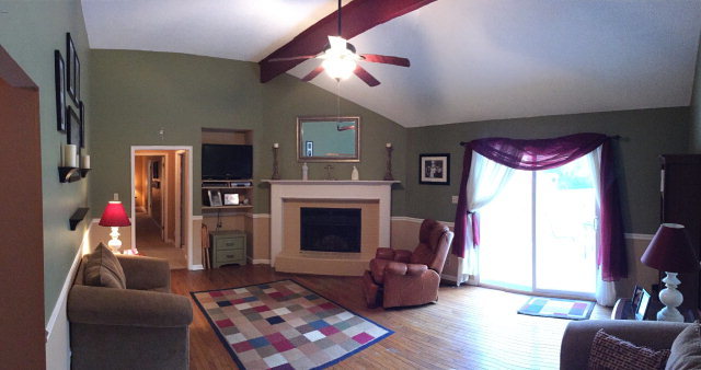 5798 Huddersfield Road Macon, GA 31210 - Photo 7 of 35 a living room with furniture and a fireplace