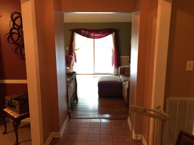 5798 Huddersfield Road Macon, GA 31210 - Photo 10 of 35 a hallway with windows and a table