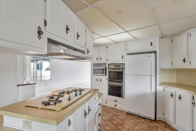 a view of a bathtub and next to a window