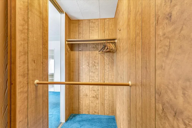 a spacious bathroom with a double vanity sink mirror and double
