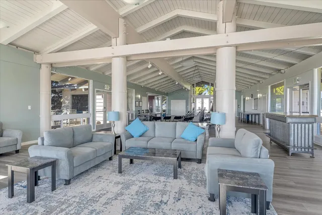 a kitchen with a dining table and chairs