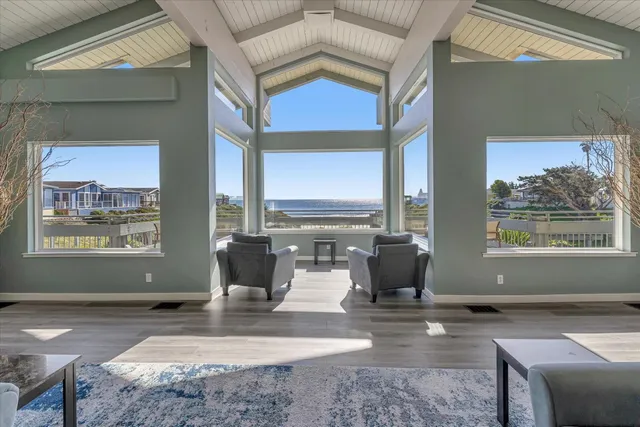 a view of a palm tree from a balcony