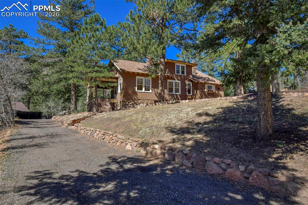 4530 Hagerman Road Cascade, CO 80809 - Photo 4 of 47 View Of Home From East Entrance To The Circular Driveway