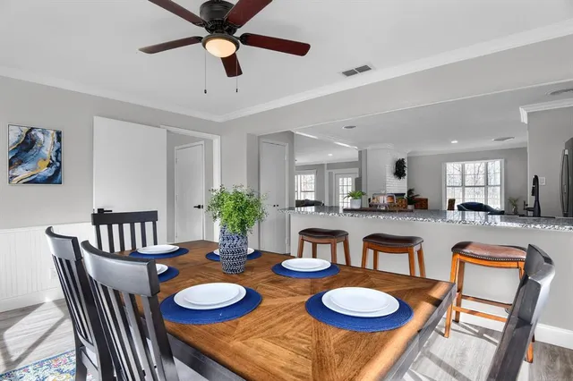 a view of cabinets with wooden floor