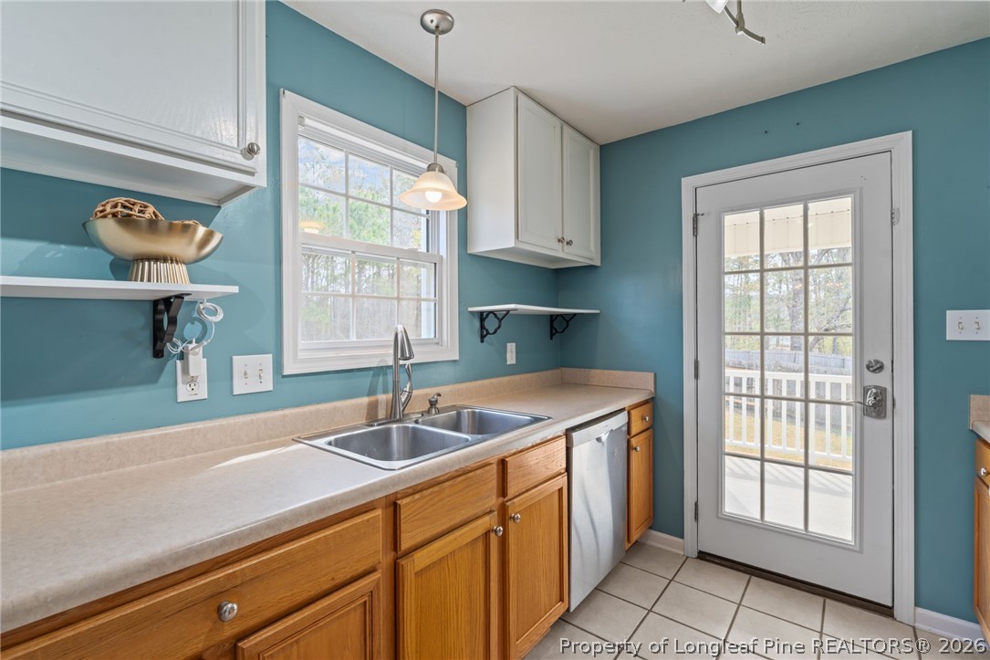 115 Shelby Street Spring Lake, NC 28390 - Photo 16 of 40 a kitchen with a sink and a window