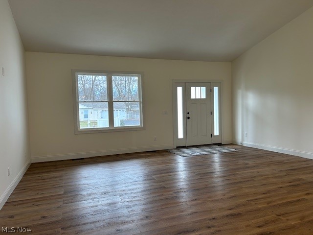1775 Green Road Madison, OH 44057 - Photo 12 of 46 family room with vaulted ceiling