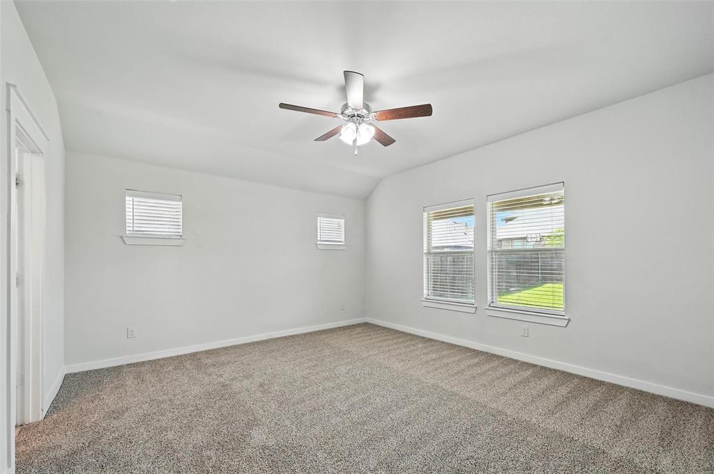 5019 Flanagan Drive Forney, TX 75126 - Photo 9 of 19 a view of an empty room with a window