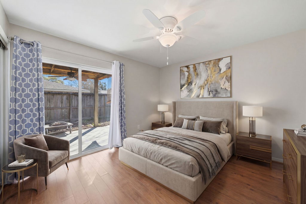 1408 Ramada Drive Houston, TX 77062 - Photo 20 of 28 a bed room with a bed and a chair