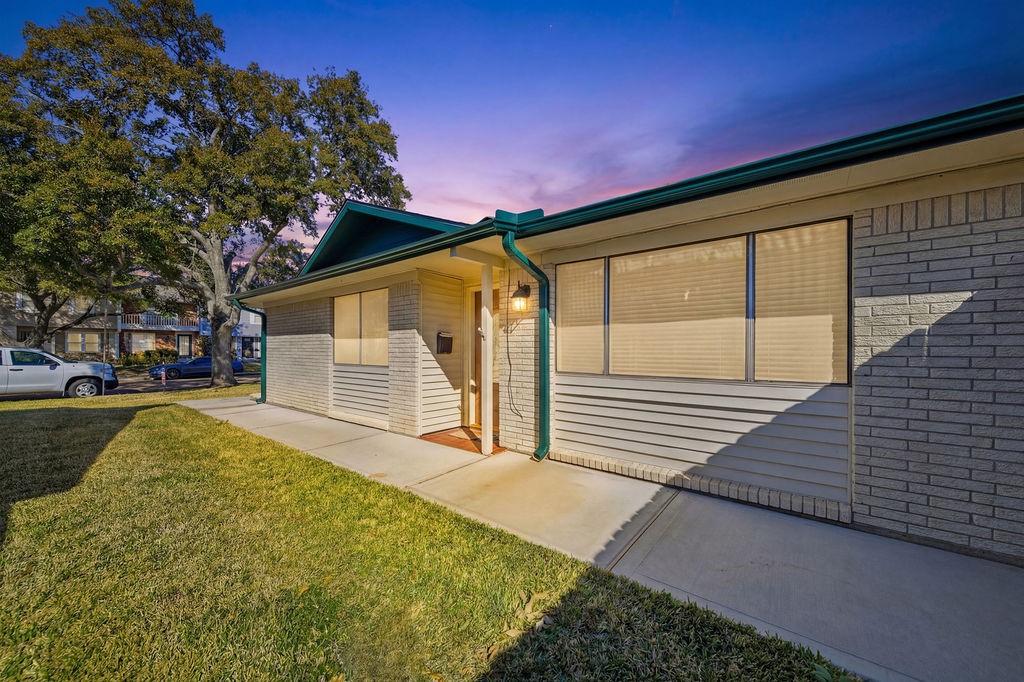 1408 Ramada Drive Houston, TX 77062 - Photo 2 of 28 a view of a house with a yard