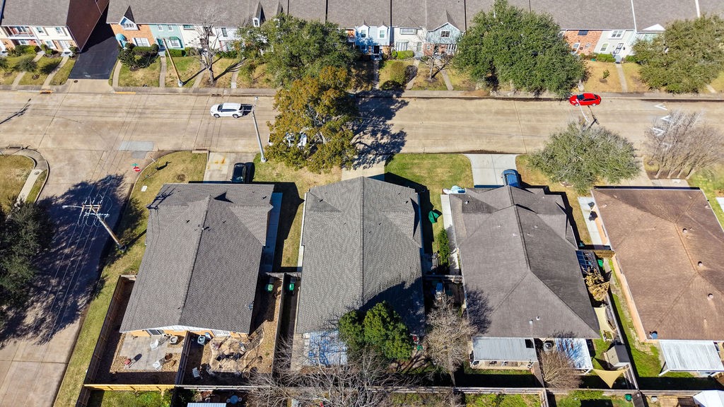 1408 Ramada Drive Houston, TX 77062 - Photo 26 of 28 an aerial view of multiple houses with yard