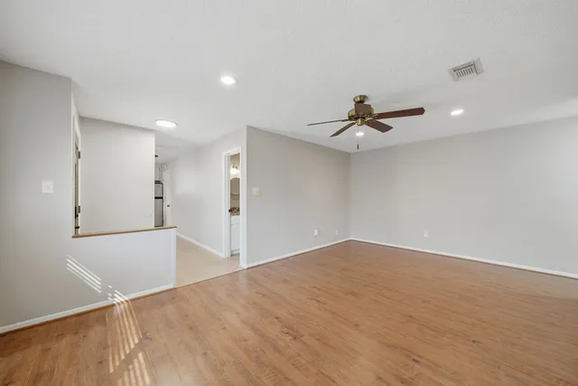 a view of a livingroom with a ceiling fan
