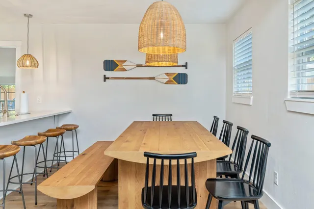 a kitchen with a refrigerator and cabinets