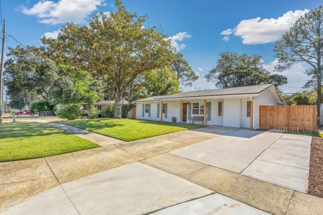 a view of house with outdoor space and entertaining space