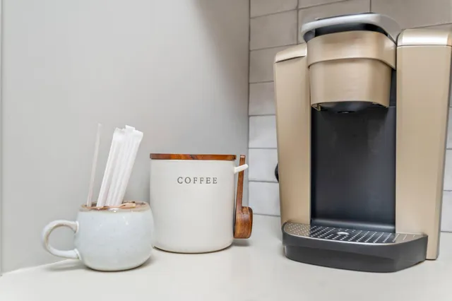 a bathroom with a toilet sink and shower