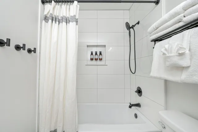 a view of outdoor space with seating area and trees around