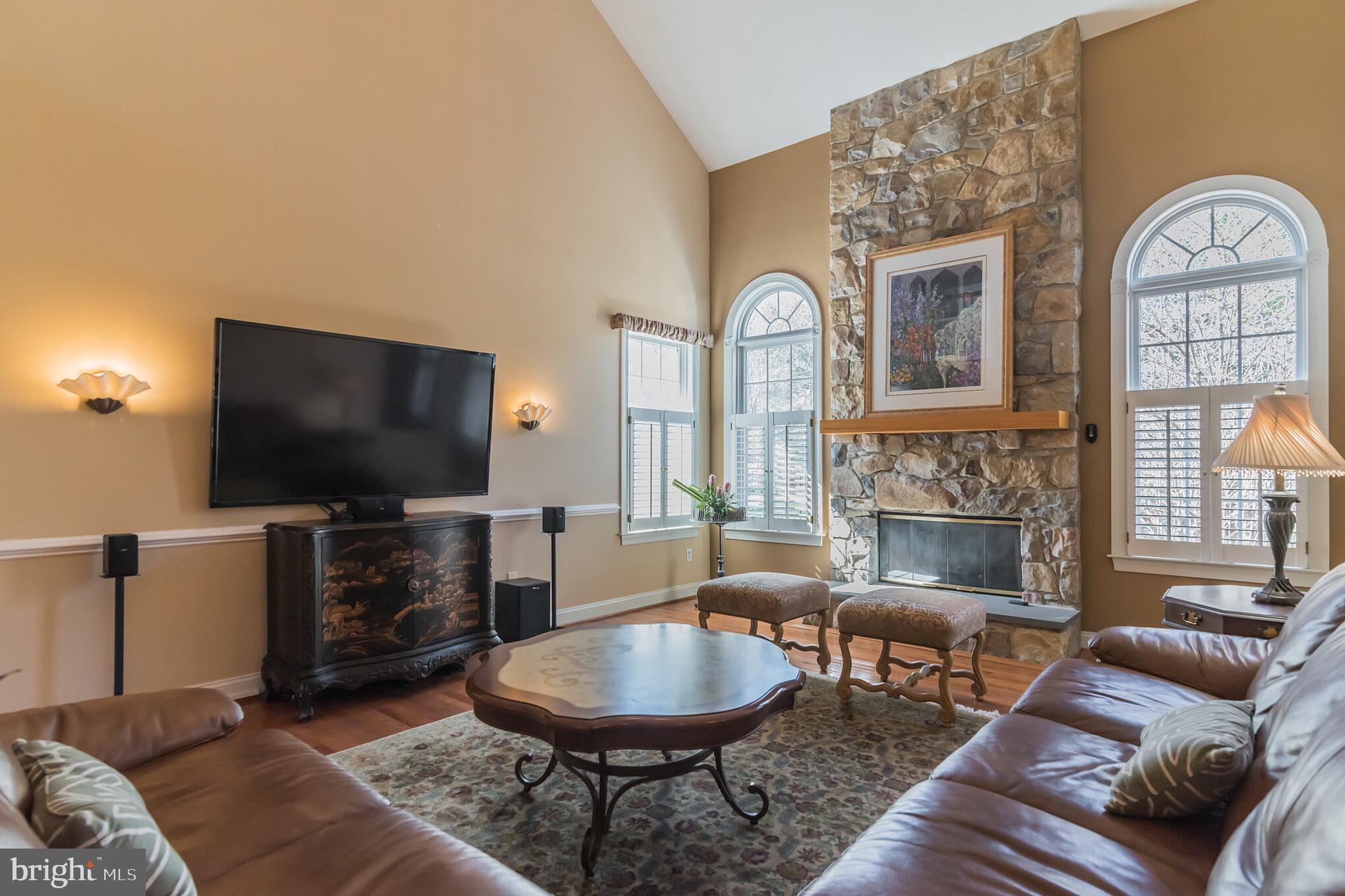 1168 Pebble Spring Drive Berwyn, PA 19312 - Photo 13 of 38 Vaulted Family Room with Stone Fireplace