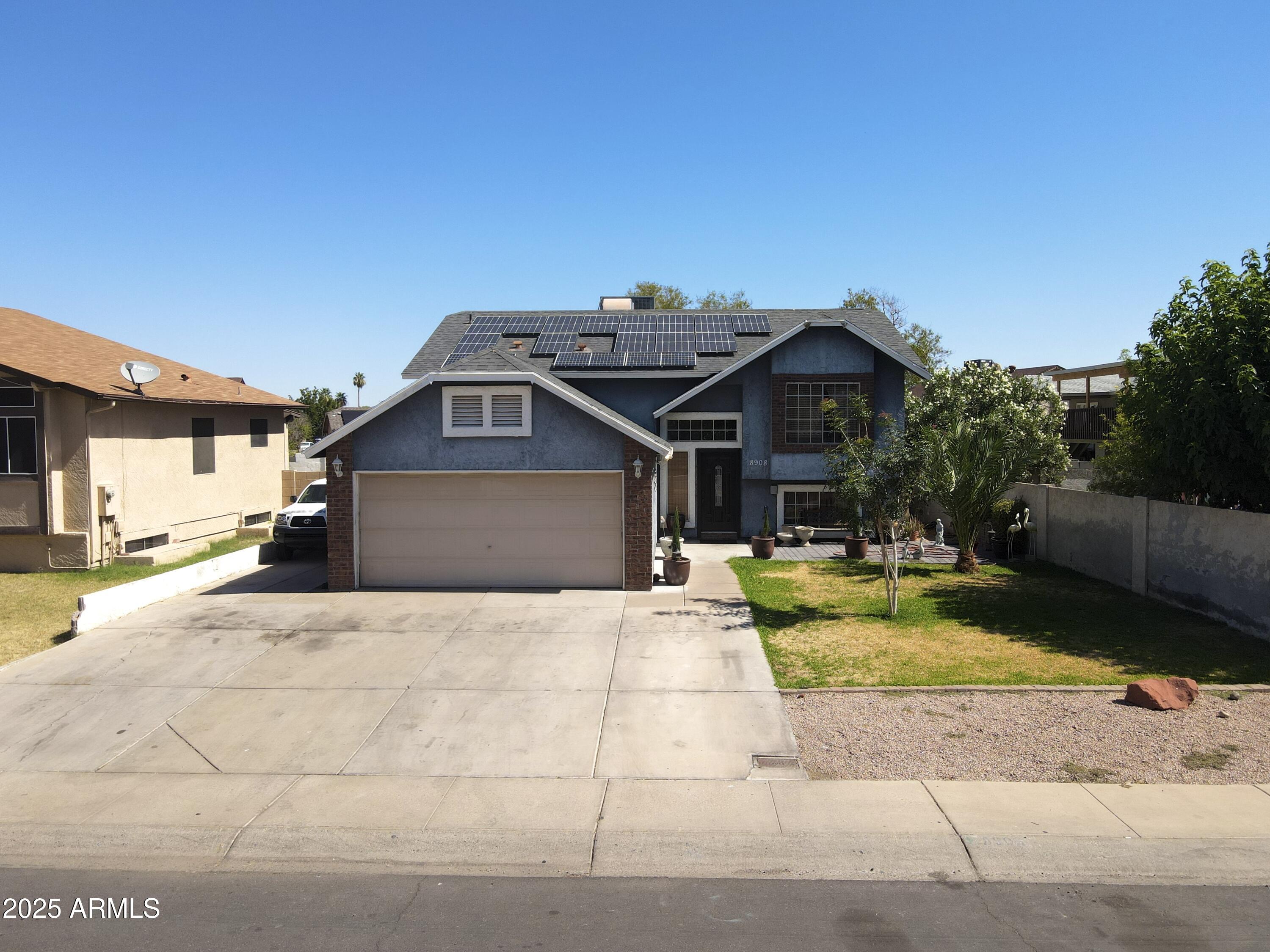 8908 West Sheridan Street Phoenix, AZ 85037 - Photo 2 of 29 front