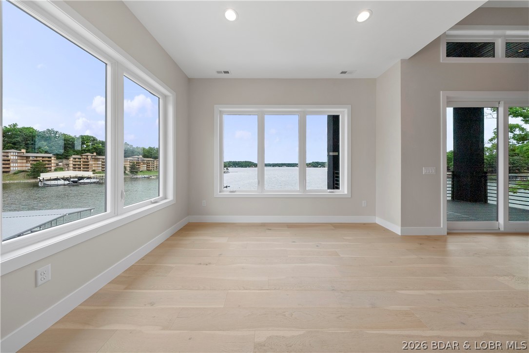 439 Red Bud Road Lake Ozark, MO 65049 - Photo 33 of 98 Spacious lakeside flex space ideal for a sitting a